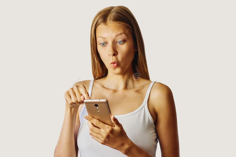 a woman surprised by the number of views on an Instagram publication