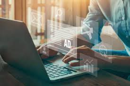 Background showing digital marketing tools on laptop