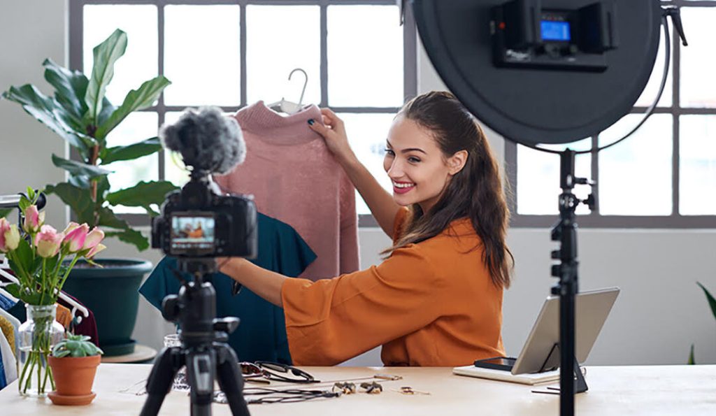 Influencer showcasing a product on social media 
