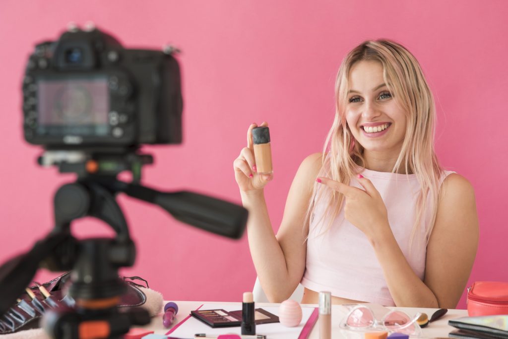 A social media influencer who gives feedback on a brand