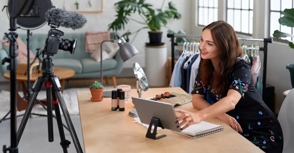 A social media influencers filming a video for a brand 