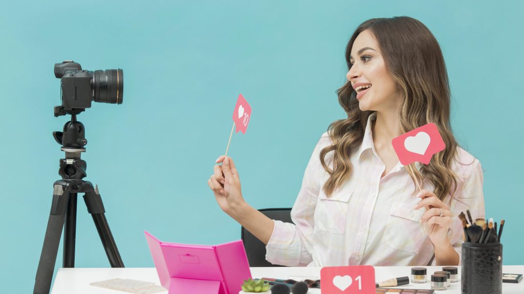 Influencer woman recommending products in front of a camera