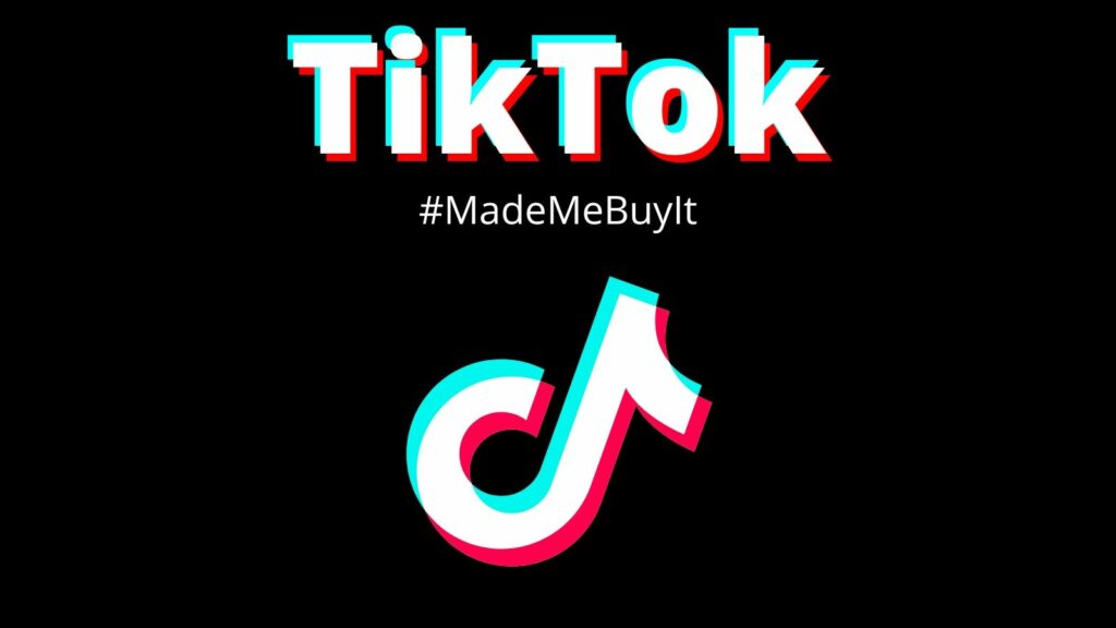 TikTok logo with hashtag #TikTokMadeMeBuyIt representing the hashtag economy,viral marketing and social commerce trends
